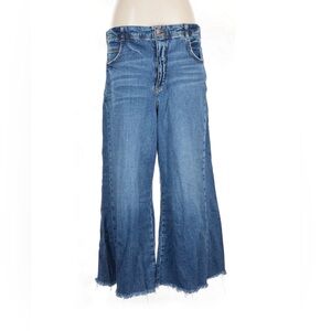 The Adi Regenerative Cotton Mid-Rise Flare Jeans by Pilcro